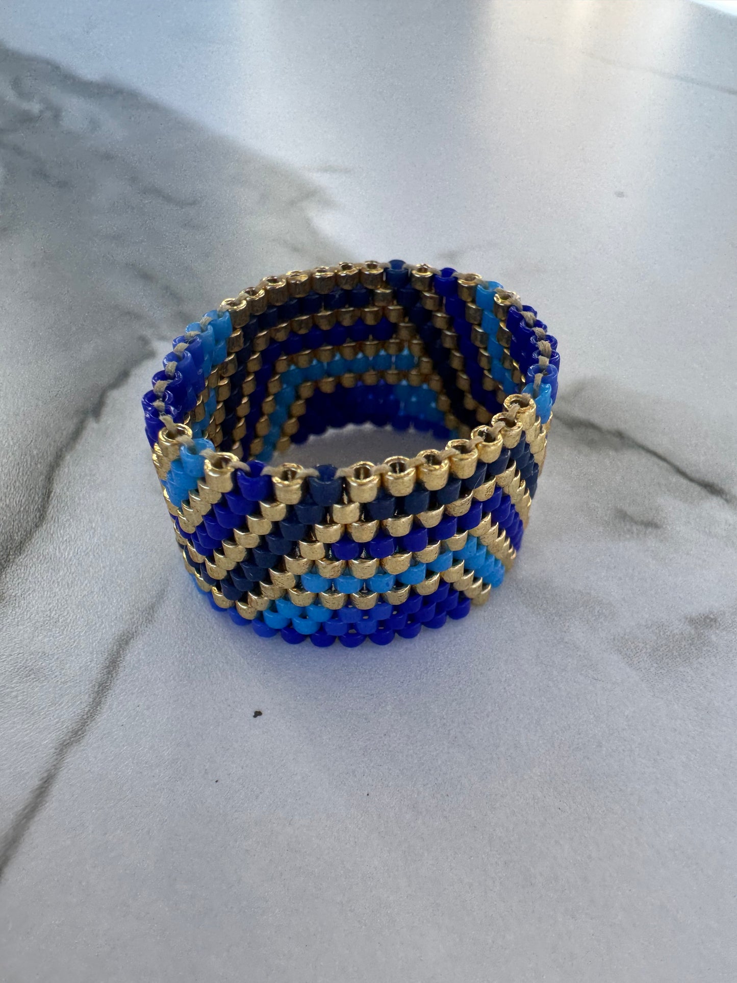 Azure Flow Cuff Ring – Handwoven Boho Luxury in Blue & Gold
