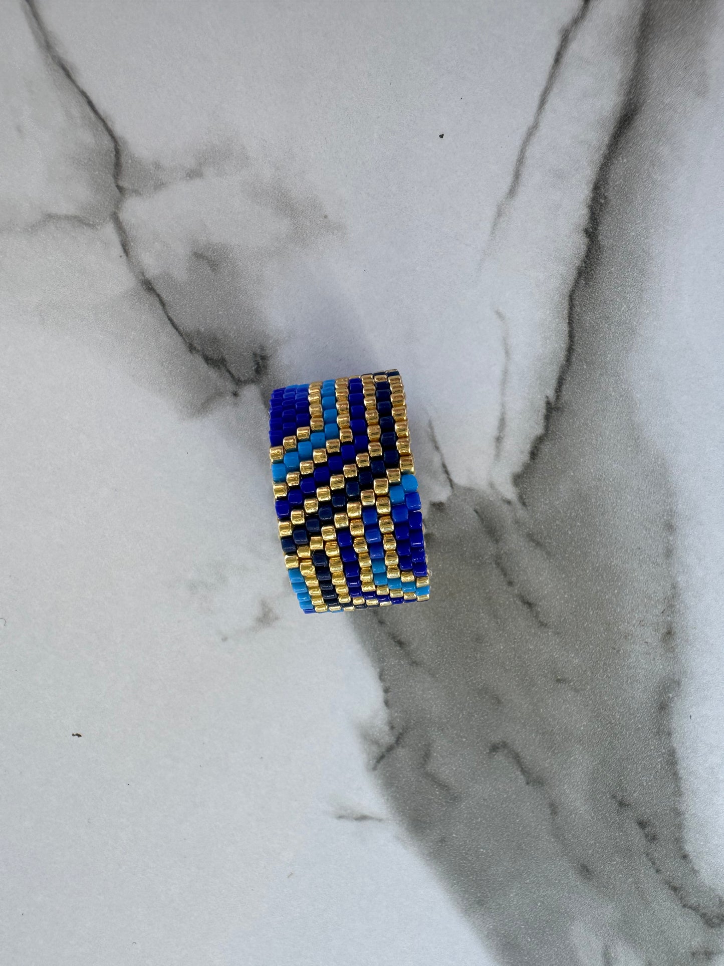 Azure Flow Cuff Ring – Handwoven Boho Luxury in Blue & Gold